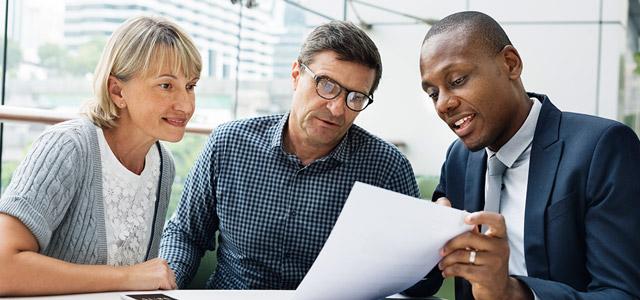 people reviewing documents